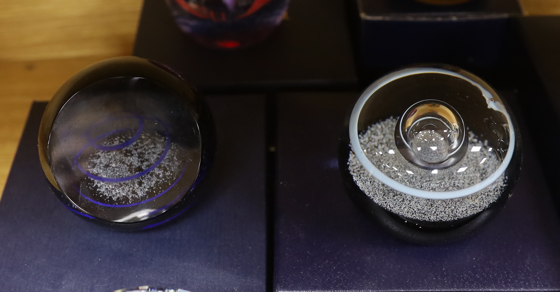 Seven Caithness paperweights, boxed, some limited edition